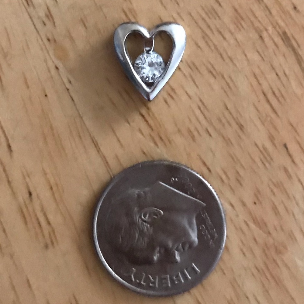 White gold and diamond pendant